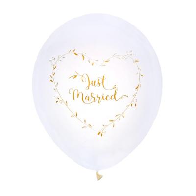 8 Ballons mariage en latex blanc avec l'inscription Just Married au centre d'un cœur de fleur le tout coloris blanc et or