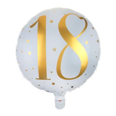 Un ballon en aluminium de 35 cm de diamètre fond blanc avec l'inscription 18 et des étoiles coloris or pailletés pour un déco de fête d'anniversaire 18 ans.