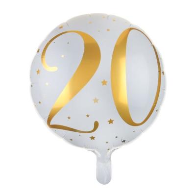 Un ballon en aluminium de 35 cm de diamètre fond blanc avec l'inscription 20 et des étoiles coloris or pailletés pour un déco de fête d'anniversaire 18 ans.