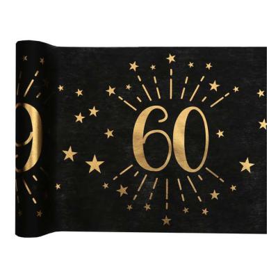 5 Mètres chemin de table anniversaire 60 ans en intissé, fond noir, impression du chiffre 60 et d'étoiles coloris or métallisé.