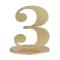 En bois coloris or, le chiffre 3 posé sur son  support à utiliser comme marque table ou en déco de table anniversaire.