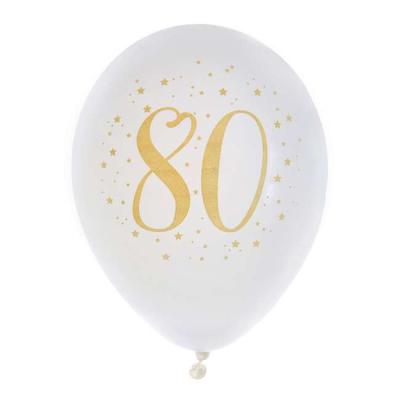 8 Ballons anniversaire en latex de 23 cm, fond blanc avec le chiffre 80 entouré de points et étoiles coloris or métallisé.