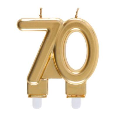 Une bougie d'anniversaire 70 ans coloris  Or formant le chiffre 70 à piquer sur le gâteau.